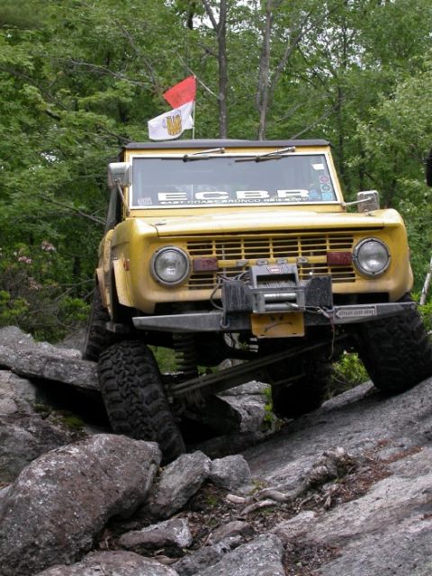 1975 Ford Bronco - This 1975 Ford Bronco is shown tackling a challenging rocky terrain during an off-road excursion.