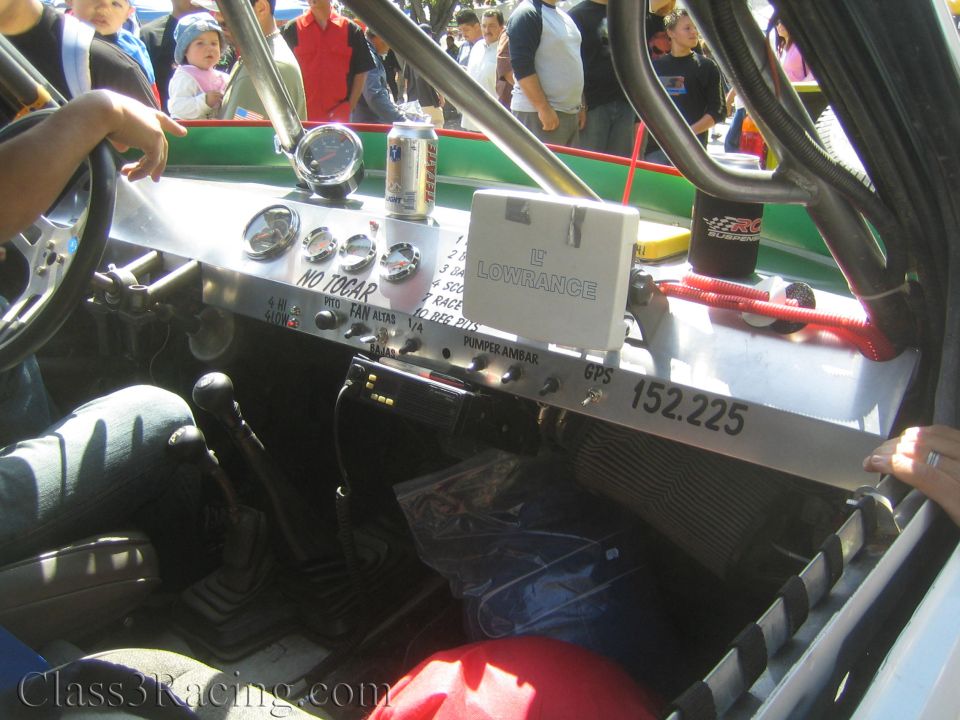 Race truck dashboard with gauges, Lowrance GPS and switch panel