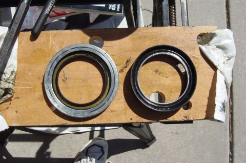 1996 Ford Bronco - The one on the left shows signs of the where the rubber part of the seal rubbed on the metal making the squeak.
