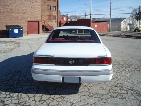 1992 Ford Crown Victoria - This Mercury Grand Marquis has a red interior and is parked in an industrial area.