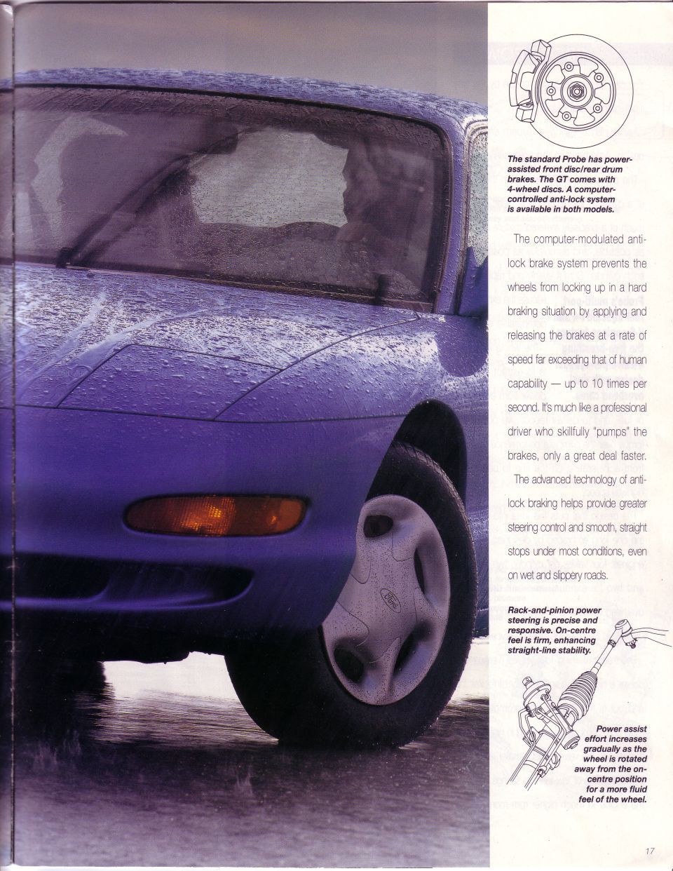1993 Ford Probe front quarter view in the rain, showing wheel and fender