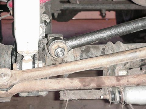 1992 Ford Bronco - trac bar fix with a tapered fix for a wllowed out hole.