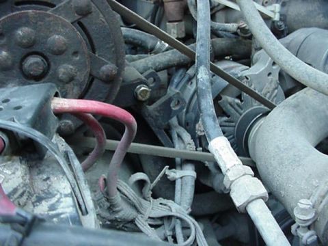 1992 Ford Bronco - the bracket attaching it to the alt.