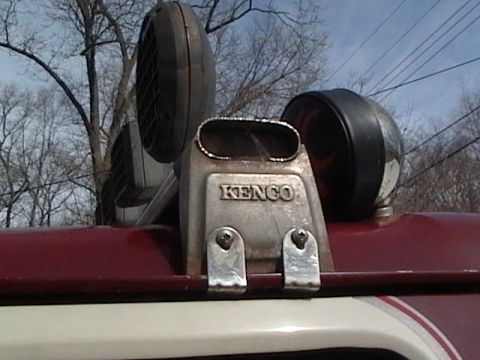 1990 Ford Bronco - The Kenco snorkel and auxiliary lights are visible on the vehicle's exterior.