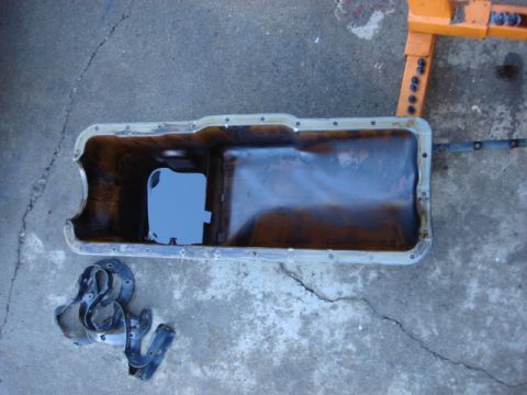 1983 Ford Bronco - time to toss the old gasket and clean the oil pan.