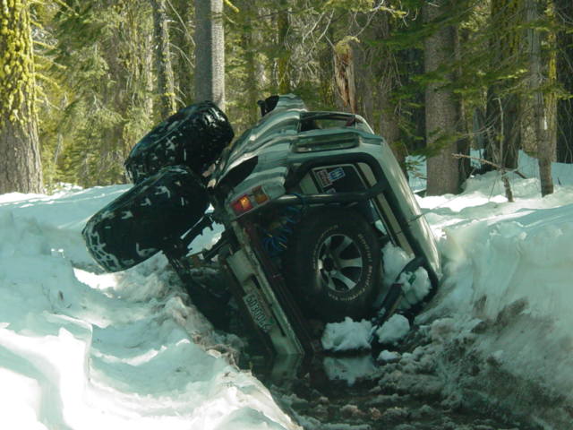1986 Ford Bronco stuck in snow, 3/4 front view