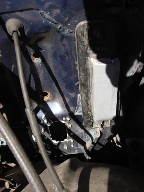 1983 Ford Bronco - here is under the hood with the gasket in place. i covered the connection point to keep out dirt. looks good.