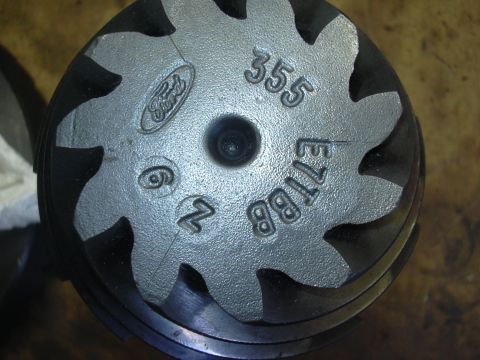 1996 Ford Crown Victoria - Close-up of a Ford differential gear, showing the '355' marking, indicating a 3.55 gear ratio.