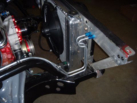 1984 Ford Bronco - The radiator and fan assembly are shown with custom metal tubing and engine parts.