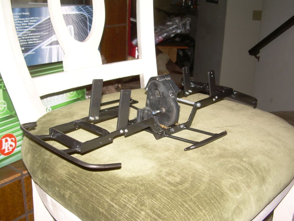 RC crawler chassis with gearbox and frame components