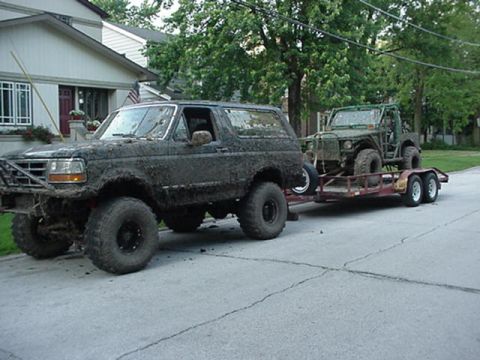 1992 Ford Bronco - Both my rigs after a bogging day.