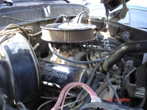 1979 Ford Bronco - Close-up view of an engine bay, showing the air filter and valve covers.