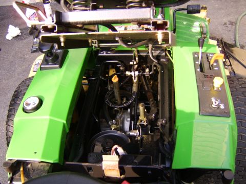 1996 Mercury Grand Marquis - Close-up view of a lawn mower's engine and control panel.