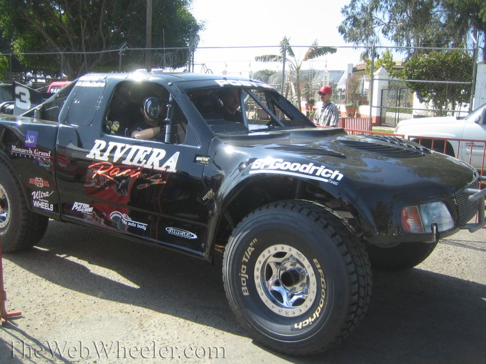 Black Riviera Racing off-road truck with low-profile body on BFGoodrich tires