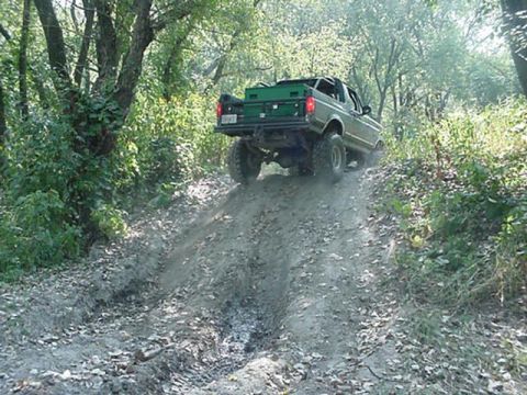 1992 Ford Bronco - hard hill, really hard when wet. wasnt to bad today, but it will slide you into the tree. when its wet it requires the front locker to make…