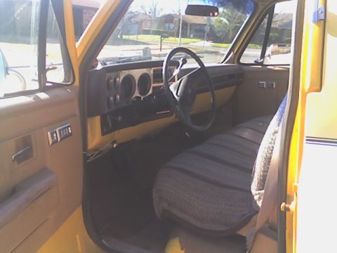 1984 Chevrolet Suburban - View from the driver's door.