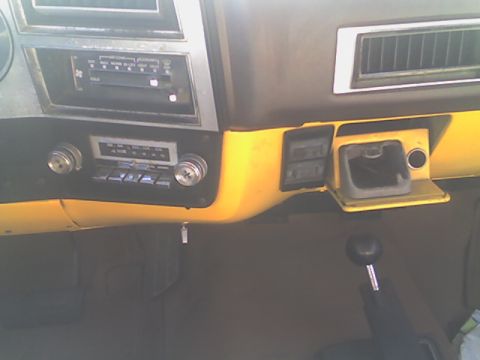 1984 Chevrolet Suburban - 4-wheel drive shifter, ashtray, stereo, and the floorboard (rubber, easier to clean)