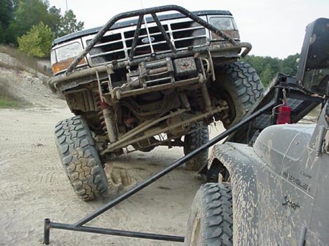 1992 Ford Bronco - front, and a very scared jeep. no wheels where off the ground yet.