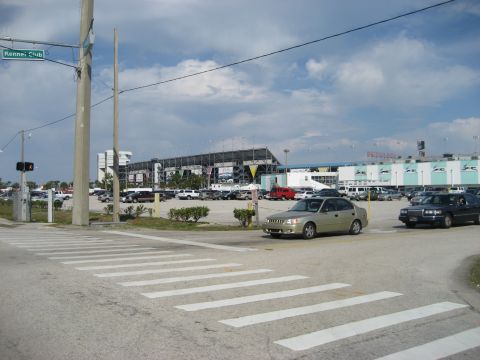 1986 Ford Bronco - A view of a parking lot and stadium, with a street sign indicating 'Kennel Club'.