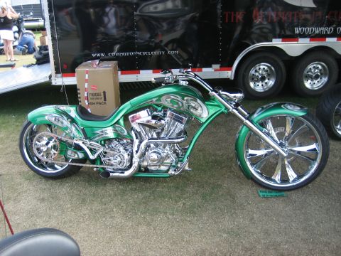 1986 Ford Bronco - Custom chopper motorcycle with elaborate paintwork and chrome details displayed outdoors.