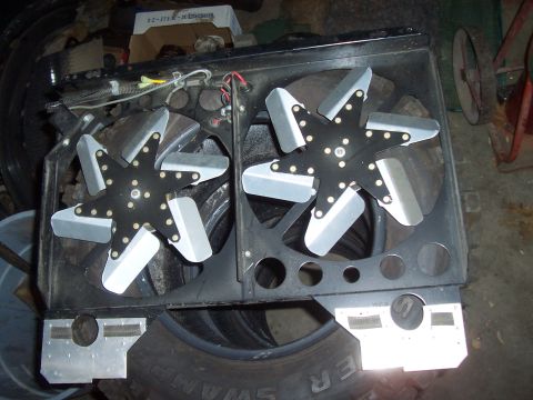 1994 Ford F-150 - A pair of electric cooling fans are shown, likely for a vehicle's radiator system.