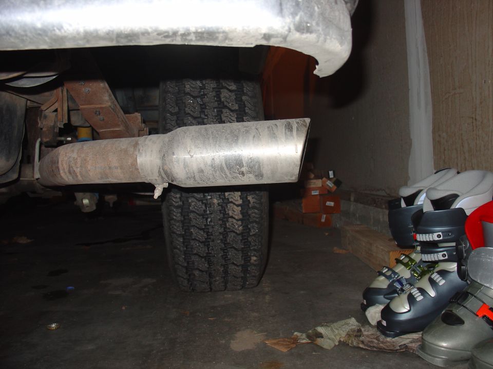 Exhaust pipe and tire of a vehicle