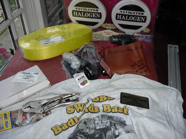 dtuff i won in raffle, (items not pictered i won also) 2 delxue roll bar grab handles, 2 normla roll bar grab handles, and 4 end tire bar.  thanks hagars 4wd!