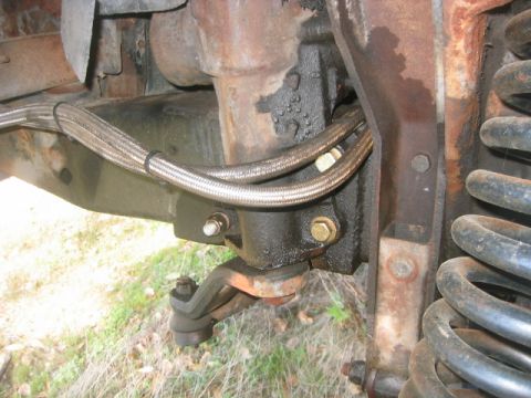 1973 Ford F-100 - '73 F-100 I converted to power steering with '78 Bronco parts. 4" lift, dropped pitman arm and trac bar mount. Note angle iron welded to fr…