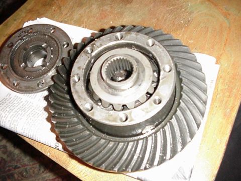 1992 Ford Bronco - Close-up view of differential gears and a bearing cap, likely for a vehicle's drivetrain.
