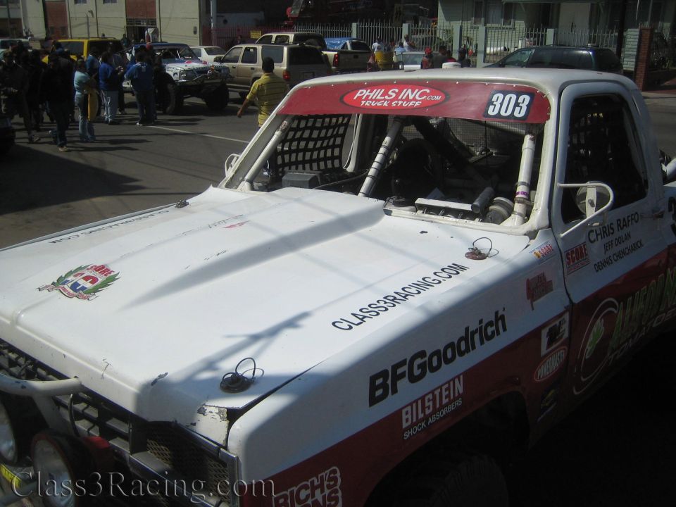 White off-road race truck #303 hood with BFGoodrich and Bilstein decals