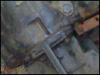 1996 Ford F-150 - A close-up view of an engine part, identified by the SuperMotors logo.