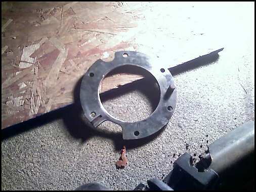 Metal flange part on textured surface