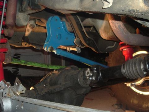 1996 Ford F-150 - Close-up view of the undercarriage, highlighting suspension parts and the driveshaft, with Supermotors.net visible.
