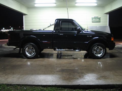 2003 Ford Ranger - Side view of a black 2003 Ford Ranger Edge pickup truck.