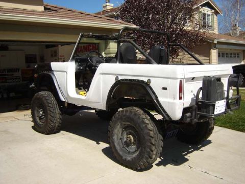 1971 Ford Bronco - This 1971 Ford Bronco is undergoing modifications, large off-road tires and a custom rear bumper with a jerry can mount.