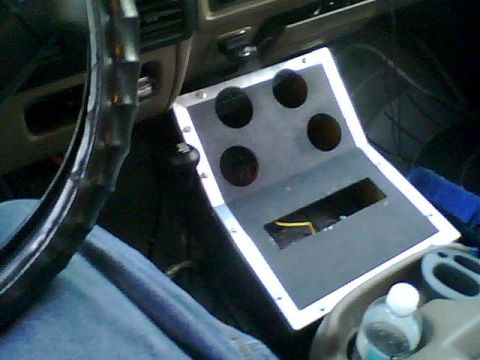1995 Ford Bronco - Custom center console modification with openings for gauges and electronics.