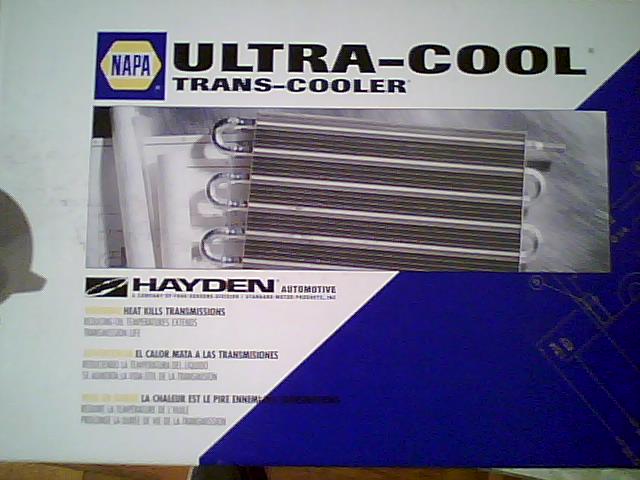 Box for a NAPA Ultra-Cool transmission cooler, showing the cooler fins and text about heat and transmissions