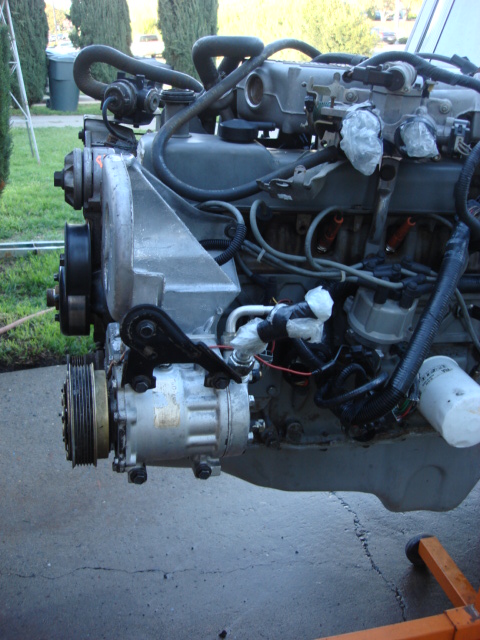 1983 Ford Bronco - here is a side view of the new mount and AC compressor installed.