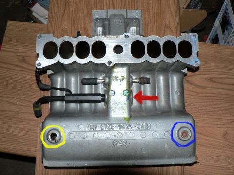 1993 Mercury Grand Marquis - Ford intake manifold part with visible part number and sensor. No year information is present.