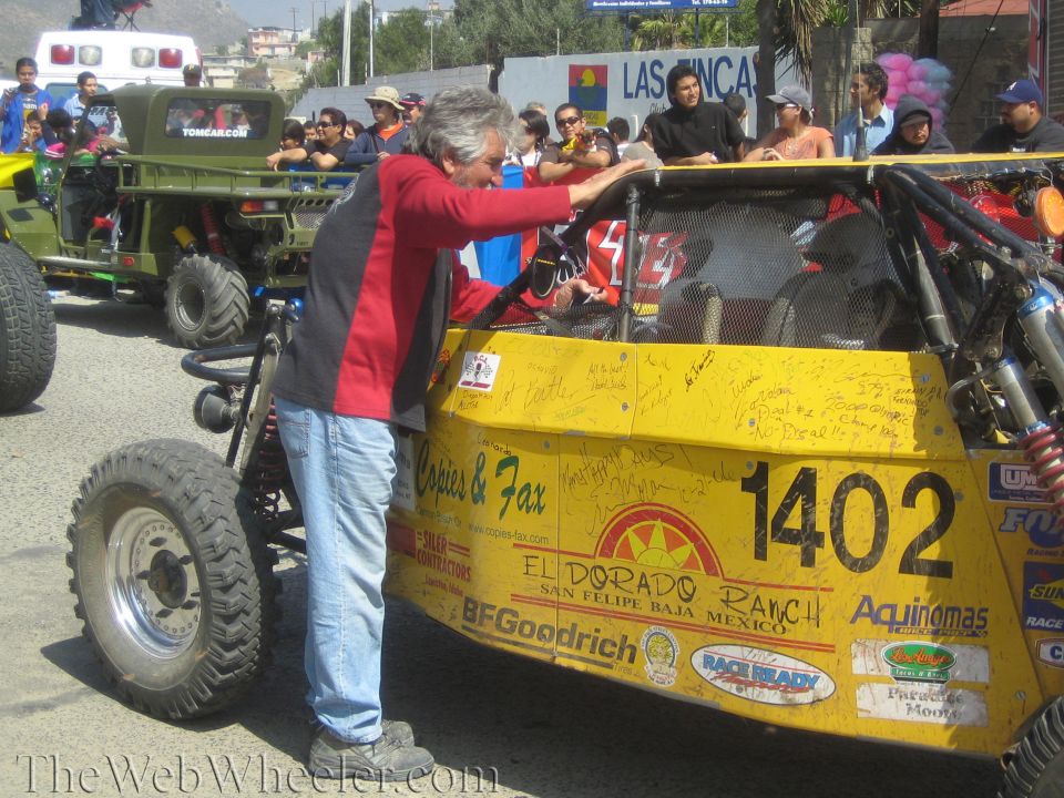 Yellow off-road buggy no. 1402 signed by fans with El Dorado Ranch livery