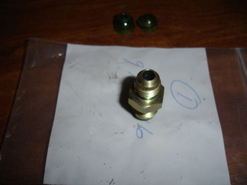 1996 Ford Bronco - A single metal fitting is shown on a piece of paper with some handwritten markings.