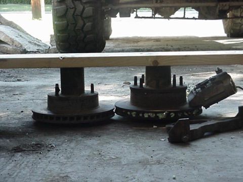 1992 Ford Bronco - side veiw of a 8 lug rotor with spindle attached compared to the 5 lug rotor with spindle attached. same overall height as easier seen with…