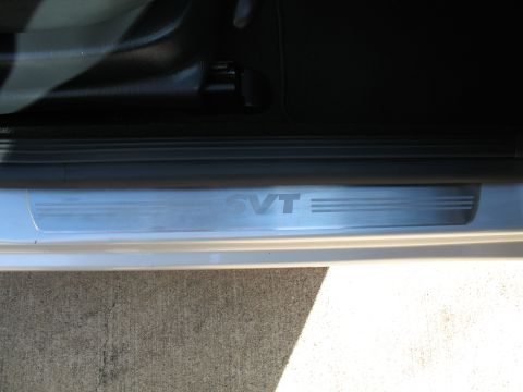 1993 Ford Bronco - The door sill plate has the SVT logo etched into it.