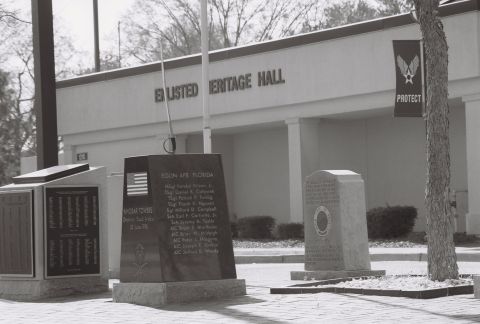 1973 Ford Ranchero - A monument lists names of fallen service members outside a building labeled 'Enlisted Heritage Hall'.
