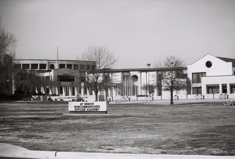 Academy building with sign reading AF SENIOR NONCOMMISSIONED OFFICER ACADEMY