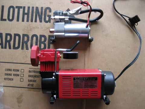1979 Ford Bronco - Comparison of the tiny compressor that comes with the Air ride kit and the Superflow pump I'm going to use instead