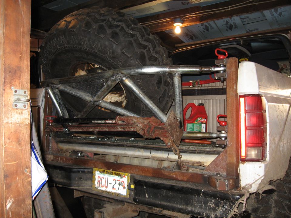 My rear panels were rotten...nice new-ish tailgate wouldn't stay closed.  So I pulled it and built this TireGate clone!