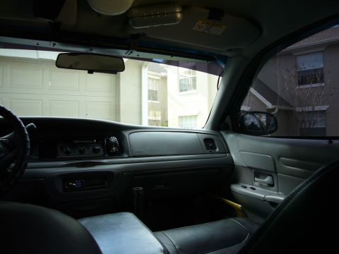 2000 Ford Crown Victoria - Interior view of a 2000 Ford Crown Victoria, looking towards the dashboard and passenger door.