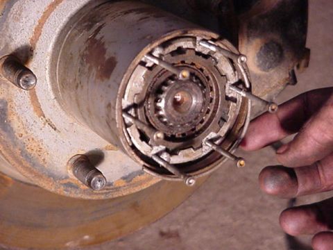 1992 Ford Bronco - start by jacking up the vehicle and setting it on jackstands, remove wheel, and take the hub cover off. then remove the 2 C clips holding i…