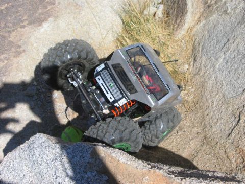 1985 Ford Bronco - A remote control rock crawler navigates a challenging rocky obstacle course.